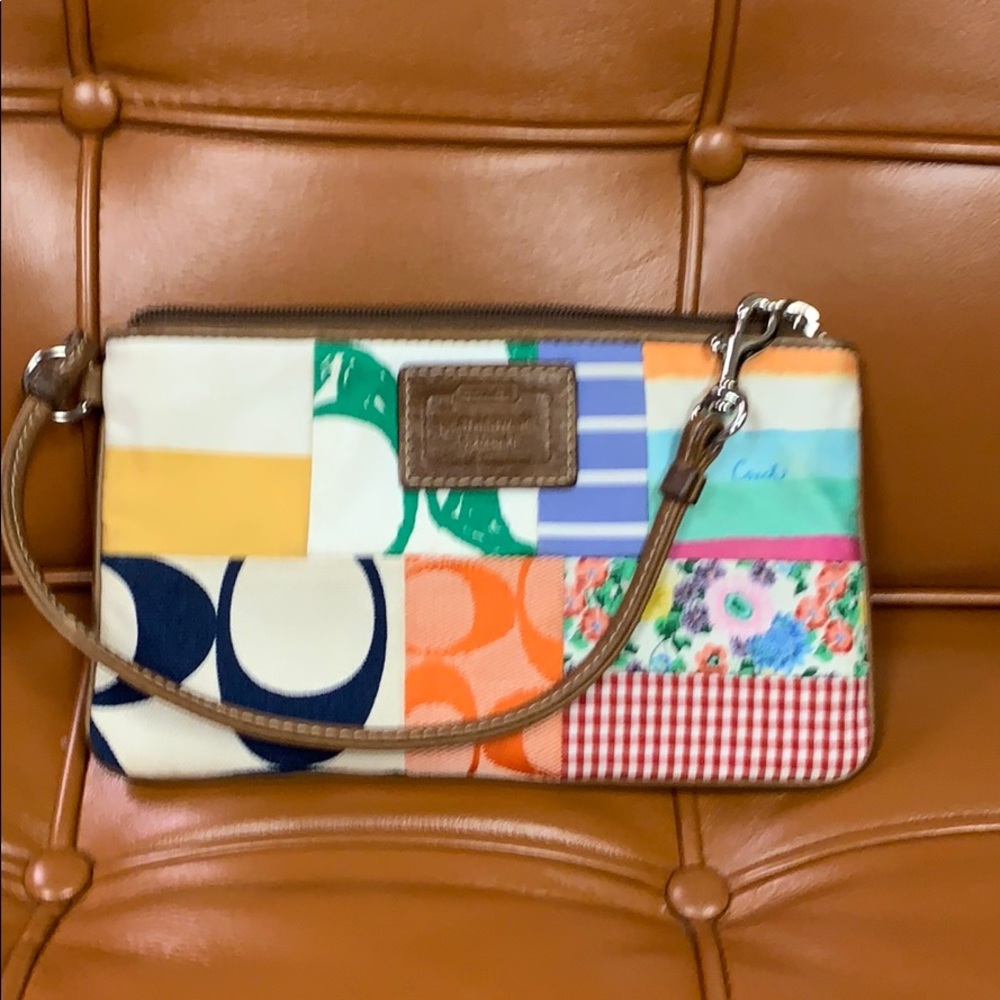 Small authentic coach wristlet.  Summer!
